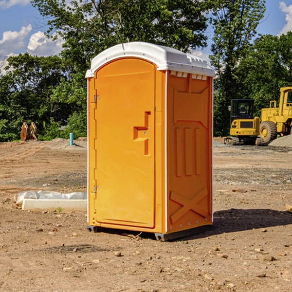 what is the cost difference between standard and deluxe porta potty rentals in Rhame